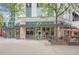 Outdoor dining at restaurant with a full-service bar and an inviting atmosphere at 860 Peachtree Ne St # 2616, Atlanta, GA 30308