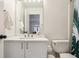 Modern bathroom with marble countertops and vanity at 1209 Brookhaven Woods Ne Ct, Brookhaven, GA 30319