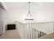 Hallway featuring high ceilings and eye-catching chandelier at 1209 Brookhaven Woods Ne Ct, Brookhaven, GA 30319