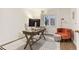 Bright home office featuring a wooden desk and comfortable seating area at 1209 Brookhaven Woods Ne Ct, Brookhaven, GA 30319