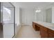 Spacious bathroom with double closets, double vanity, and separate shower at 12554 Huntington Trce, Alpharetta, GA 30005