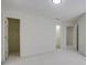 Bedroom with ensuite access, ample space, and plush neutral-colored carpeting at 12554 Huntington Trce, Alpharetta, GA 30005
