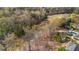 Aerial view of surrounding woods and golf course, creating a serene and private atmosphere at 3139 Players Dr, Jonesboro, GA 30236