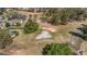 Aerial view of home and surrounding golf course featuring manicured fairways and lush greenery at 3139 Players Dr, Jonesboro, GA 30236