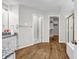 This bathroom has granite counters, wood floors, and a glass-enclosed shower at 3139 Players Dr, Jonesboro, GA 30236