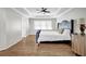 This bedroom boasts wood floors, natural light, and a tray ceiling at 3139 Players Dr, Jonesboro, GA 30236