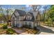 Spacious home with an attached two-car garage and a long driveway at 3139 Players Dr, Jonesboro, GA 30236