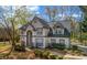 Elegant two-story home with a neutral color scheme and meticulously landscaped front yard at 3139 Players Dr, Jonesboro, GA 30236