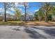 Charming two-story home with a well-manicured front yard and mature trees at 3139 Players Dr, Jonesboro, GA 30236