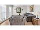 Comfortable living room with hardwood floors, soft lighting, and neutral wall colors at 3139 Players Dr, Jonesboro, GA 30236