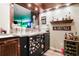 Entertaining home bar with stainless steel bar top, lots of storage and custom Bartender sign at 561 Valleyside Dr, Dallas, GA 30157