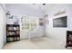 Bright bedroom with white walls and a window, ideal as an office or extra room at 561 Valleyside Dr, Dallas, GA 30157