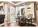 Cozy breakfast nook with a round table and view of the outdoor greenery at 561 Valleyside Dr, Dallas, GA 30157