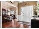 Elegant foyer with hardwood floors and a view of the dining area at 561 Valleyside Dr, Dallas, GA 30157