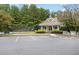 Clubhouse and tennis courts near the parking lot at 561 Valleyside Dr, Dallas, GA 30157