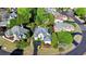 Stunning aerial view of a well-manicured home nestled in a lush, green neighborhood at 7080 Greatwood Trl, Alpharetta, GA 30005