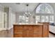 Kitchen island with seating and storage at 7080 Greatwood Trl, Alpharetta, GA 30005