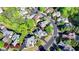 A home with a backyard pool, hot tub, mature landscaping, and inviting outdoor living space at 7080 Greatwood Trl, Alpharetta, GA 30005