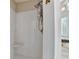 Elegant shower with tiled walls and a rainfall showerhead fixture at 7080 Greatwood Trl, Alpharetta, GA 30005