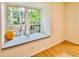 Cozy window seat overlooking the yard with a view of trees at 102 Adrian Nw Pl, Atlanta, GA 30327