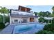 Beautiful two-story home showcasing a private backyard oasis with swimming pool and patio at 1068 Buckner Se Rd, Mableton, GA 30126