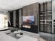 Beautiful living room with sleek fireplace, custom shelving, and large windows for natural light at 1068 Buckner Se Rd, Mableton, GA 30126
