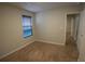 Cozy bedroom with plush carpeting and a sunlit window with modern blinds at 2362 Glebe Ct, Hampton, GA 30228