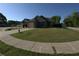 Charming home with a well-manicured lawn, sidewalk, and adjacent street view at 2362 Glebe Ct, Hampton, GA 30228