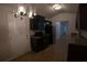 Bright kitchen with stainless steel appliances, dark cabinets, and hardwood floors at 2362 Glebe Ct, Hampton, GA 30228