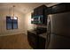 Eat-in kitchen with new stainless steel appliances and modern cabinetry at 2362 Glebe Ct, Hampton, GA 30228