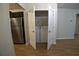 View of laundry machines inside double doors at 2362 Glebe Ct, Hampton, GA 30228