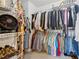 Spacious walk-in closet with ample hanging space and shelves for organized storage at 2523 Bancroft Way, Buford, GA 30519