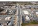 Overhead view of a busy intersection with shopping centers and well-maintained roadways at 333 Gardens Of Harmony Dr, Canton, GA 30115