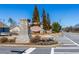 Gardens of Harmony subdivision entrance with stone sign, landscaping, and trees at 333 Gardens Of Harmony Dr, Canton, GA 30115