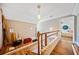 Unfinished attic space featuring hardwood floors and natural light at 3919 Evans Rd, Cumming, GA 30040