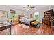 Cozy bedroom with hardwood floors, natural light, and decorative accents at 3919 Evans Rd, Cumming, GA 30040