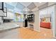 Kitchenette with sleek appliances, granite countertops, and wood-look floors in a well-lit space at 3919 Evans Rd, Cumming, GA 30040