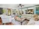 Spacious living room featuring hardwood floors, comfortable seating, and an open layout at 3919 Evans Rd, Cumming, GA 30040