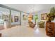 Bright living room featuring neutral tile floors and plenty of natural light at 3919 Evans Rd, Cumming, GA 30040