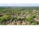 Beautiful aerial view of a neighborhood surrounded by mature trees and landscaping at 6690 Stillmeadow Dr, Cumming, GA 30040