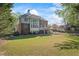 Expansive backyard with a large deck, perfect for outdoor entertaining and relaxation at 6690 Stillmeadow Dr, Cumming, GA 30040