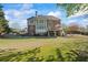 Spacious backyard featuring a large deck, offering a great space for outdoor gatherings at 6690 Stillmeadow Dr, Cumming, GA 30040