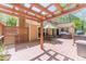 Inviting back deck with pergola, perfect for outdoor entertaining and grilling with friends and Gathering at 255 Sageglen Rd, Lawrenceville, GA 30044