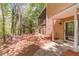 Exterior view showcasing a cozy patio area and access to the deck, perfect for indoor-outdoor living at 255 Sageglen Rd, Lawrenceville, GA 30044