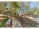 Lovely backyard featuring a playground and picnic area near the water at 255 Sageglen Rd, Lawrenceville, GA 30044