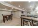 Spacious finished basement with kitchenette and living area, great for entertaining or relaxing at 255 Sageglen Rd, Lawrenceville, GA 30044