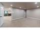Basement room with a recreational area leading to other rooms offering a flexible layout for various uses at 255 Sageglen Rd, Lawrenceville, GA 30044