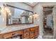 Bathroom featuring a walk-in shower, vanity with large mirrors and skylight at 255 Sageglen Rd, Lawrenceville, GA 30044