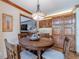 This dining area features a round table, wooden floors, and a decorative light fixture at 255 Sageglen Rd, Lawrenceville, GA 30044