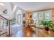 An inviting foyer with hardwood floors, staircase, and natural light at 255 Sageglen Rd, Lawrenceville, GA 30044
